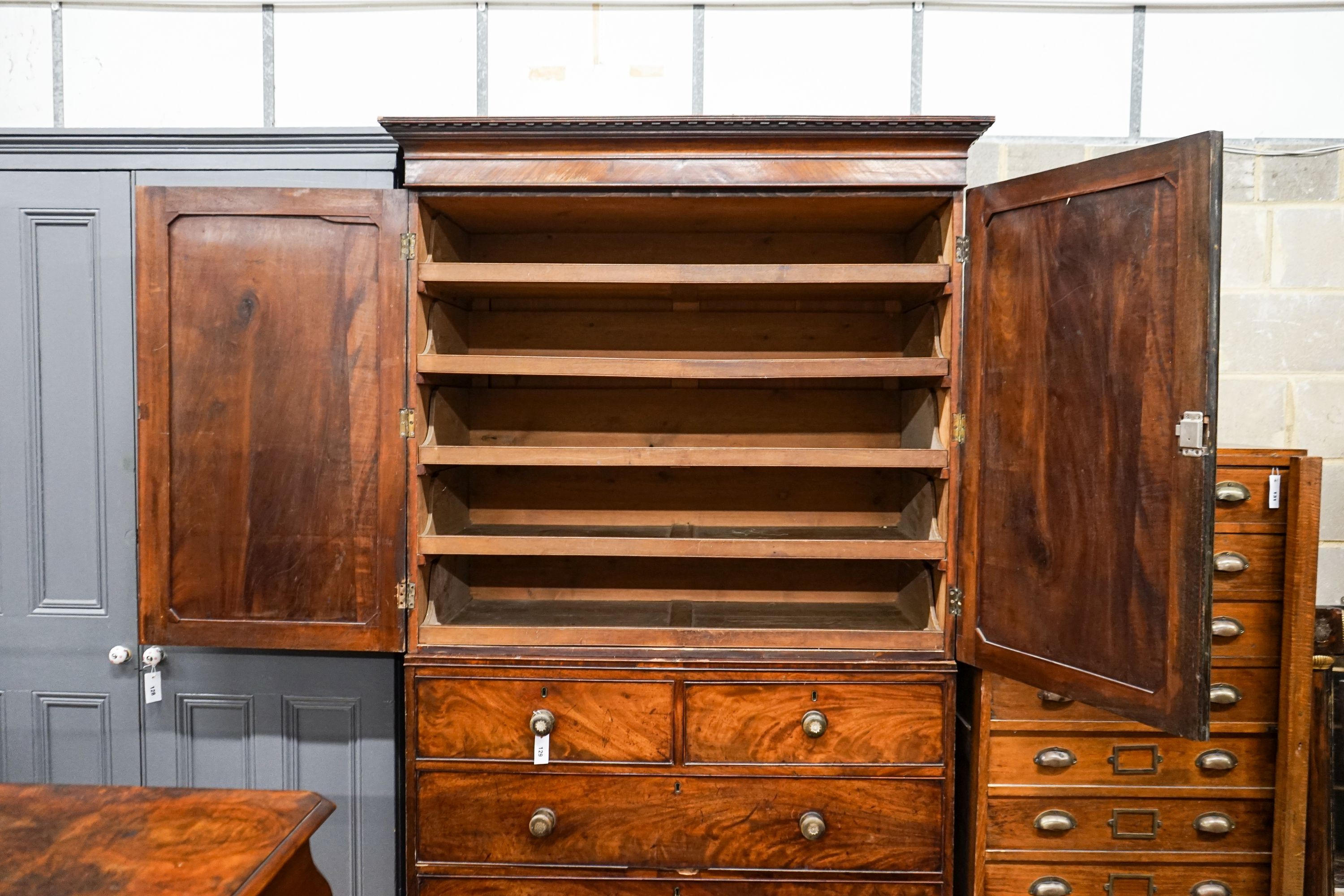 A Regency mahogany linen press, length 124cm, depth 58cm, height 212cm